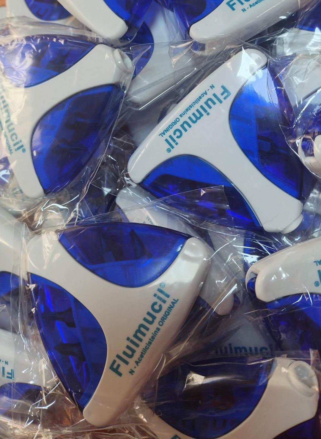 Giroscopios Fluimucil personalizados con logo — entrega corporativa en Ecuador